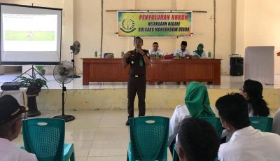 Kastel Kajari Bolmut Roberto Sohilait Ingatkan Sangadi Soal Efesiensi dan Kebocoran Anggaran Desa Dalam penyuluhan Hukum yang Digelar DPMD