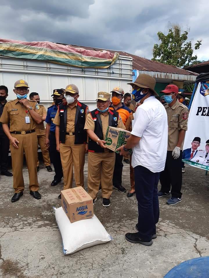 Peduli Kemanusian Banjir Bone Bolango, Pemkab Bolmut Salurkan 5 Ton Beras Premium