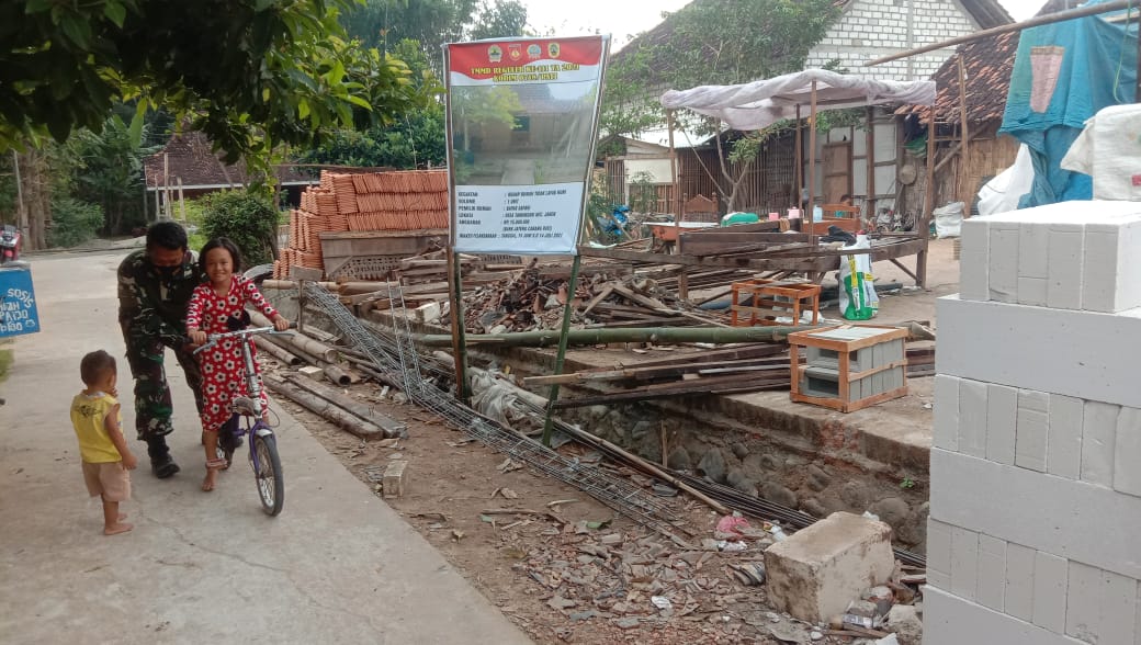 Wajah Sangar Baju Loreng Tapi Disayang Anak