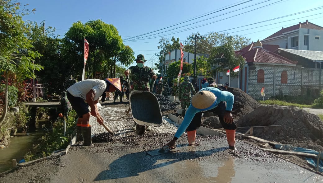 TNI Selesaikan Rabat Beton Jalan Program TMMD Reguler Ke-111 Kodim 0718/Pati