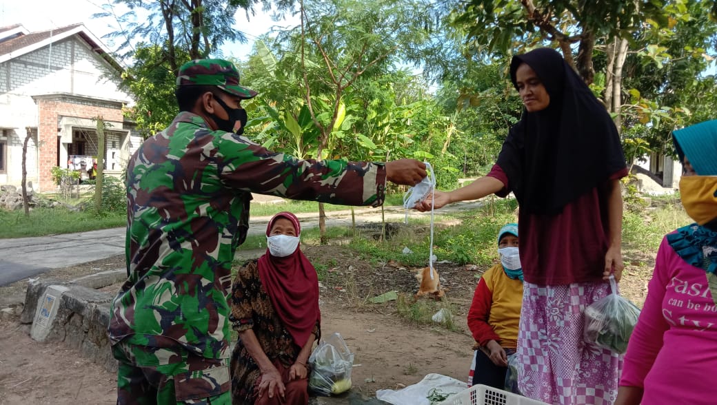 Anggota Satgas TMMD Kegiatan Non Fisik Himbauan Protokol Kesehatan