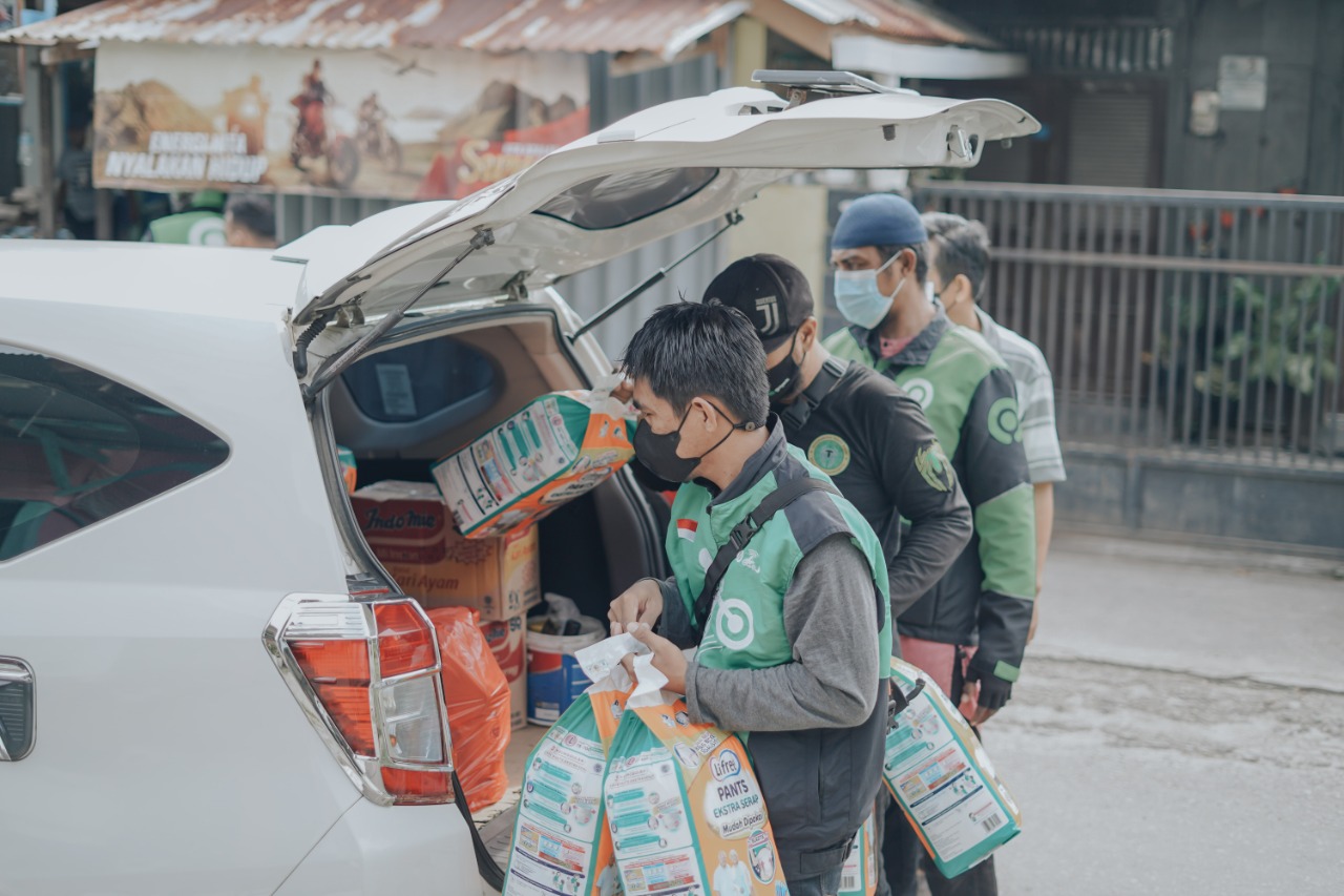 Gojek Gandeng Komunitas Mitra Driver Gelar Bakti Sosial